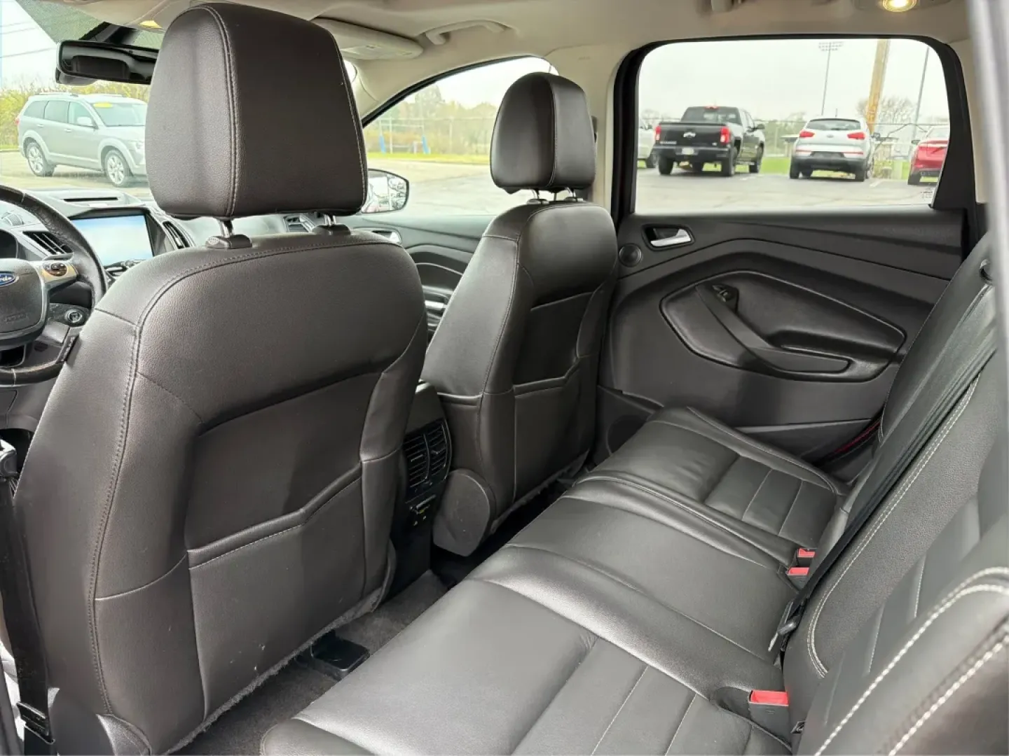 2015 Ford Escape Titanium (1FMCU0J96FU) with an Other engine, located at 401 Woodman Dr, Riverside, OH, 45431, (937) 908-9800, 39.760899, -84.123421 - **Adventure Awaits with the 2015 Ford Escape Titanium! Perfect for Family Road Trips and Daily Commuting!**<br /> <br /> Are you ready to take your adventures to the next level? This stunning Ruby Red Metallic Tinted Clearcoat 2015 Ford Escape Titanium is the ideal SUV for families, commuters, and w - Photo#10