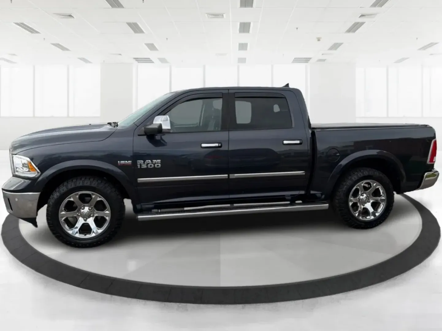 2014 Ram 1500 Laramie (1C6RR7NT8ES) with an Other engine, located at 1951 S Dayton Lakeview Rd., New Carlisle, OH, 45344, (937) 908-9800, 39.890999, -84.050255 - Are you ready to elevate your driving experience and tackle any adventure that comes your way? The 2014 Ram 1500 Laramie is not just a truck; it's an embodiment of capability, comfort, and style, making it perfect for those who lead an active lifestyle in New Carlisle, OH. Whether you're gearing up - Photo#5