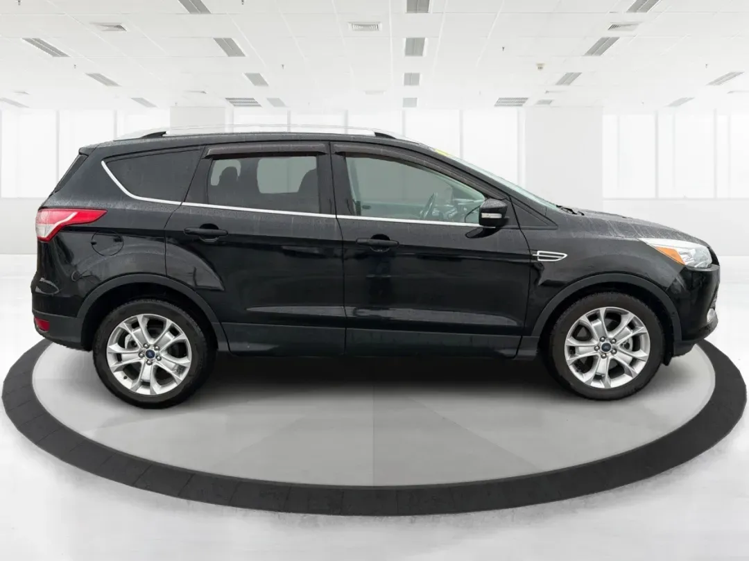 2016 Ford Escape Titanium (1FMCU0J94GU) with an 2.0L L4 DOHC 16V engine, 6-Speed Automatic transmission, located at 1184 Kauffman Ave, Fairborn, OH, 45324, (937) 908-9800, 39.807072, -84.030914 - **Explore New Adventures with the 2016 Ford Escape Titanium Perfect for Families and Commuters Alike!**<br /> <br /> Are you ready to elevate your driving experience? The 2016 Ford Escape Titanium is the ideal companion for both bustling family life and daily commutes, bringing together style, comf - Photo#1