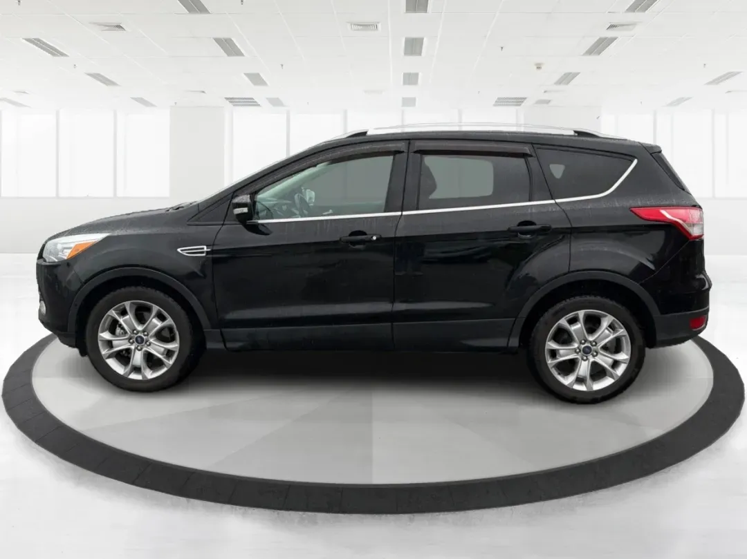 2016 Ford Escape Titanium (1FMCU0J94GU) with an 2.0L L4 DOHC 16V engine, 6-Speed Automatic transmission, located at 1184 Kauffman Ave, Fairborn, OH, 45324, (937) 908-9800, 39.807072, -84.030914 - **Explore New Adventures with the 2016 Ford Escape Titanium Perfect for Families and Commuters Alike!**<br /> <br /> Are you ready to elevate your driving experience? The 2016 Ford Escape Titanium is the ideal companion for both bustling family life and daily commutes, bringing together style, comf - Photo#5