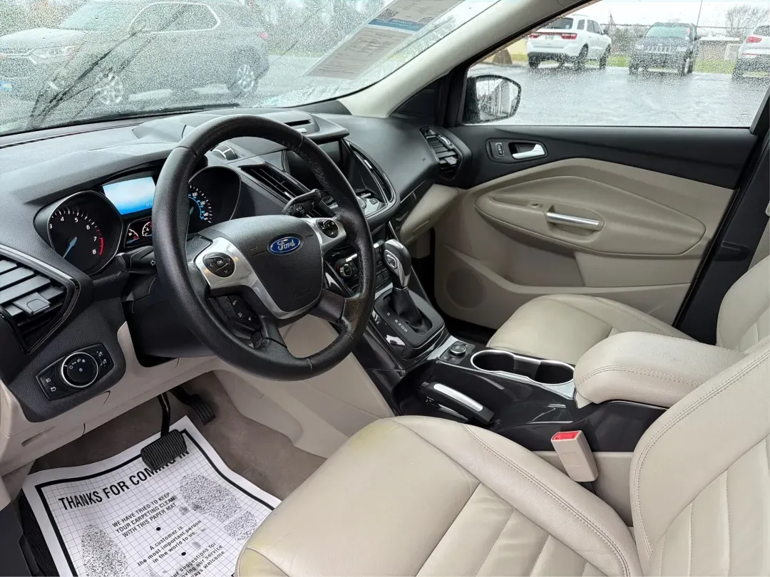 2016 Ford Escape Titanium (1FMCU0J94GU) with an 2.0L L4 DOHC 16V engine, 6-Speed Automatic transmission, located at 1184 Kauffman Ave, Fairborn, OH, 45324, (937) 908-9800, 39.807072, -84.030914 - **Explore New Adventures with the 2016 Ford Escape Titanium Perfect for Families and Commuters Alike!**<br /> <br /> Are you ready to elevate your driving experience? The 2016 Ford Escape Titanium is the ideal companion for both bustling family life and daily commutes, bringing together style, comf - Photo#9