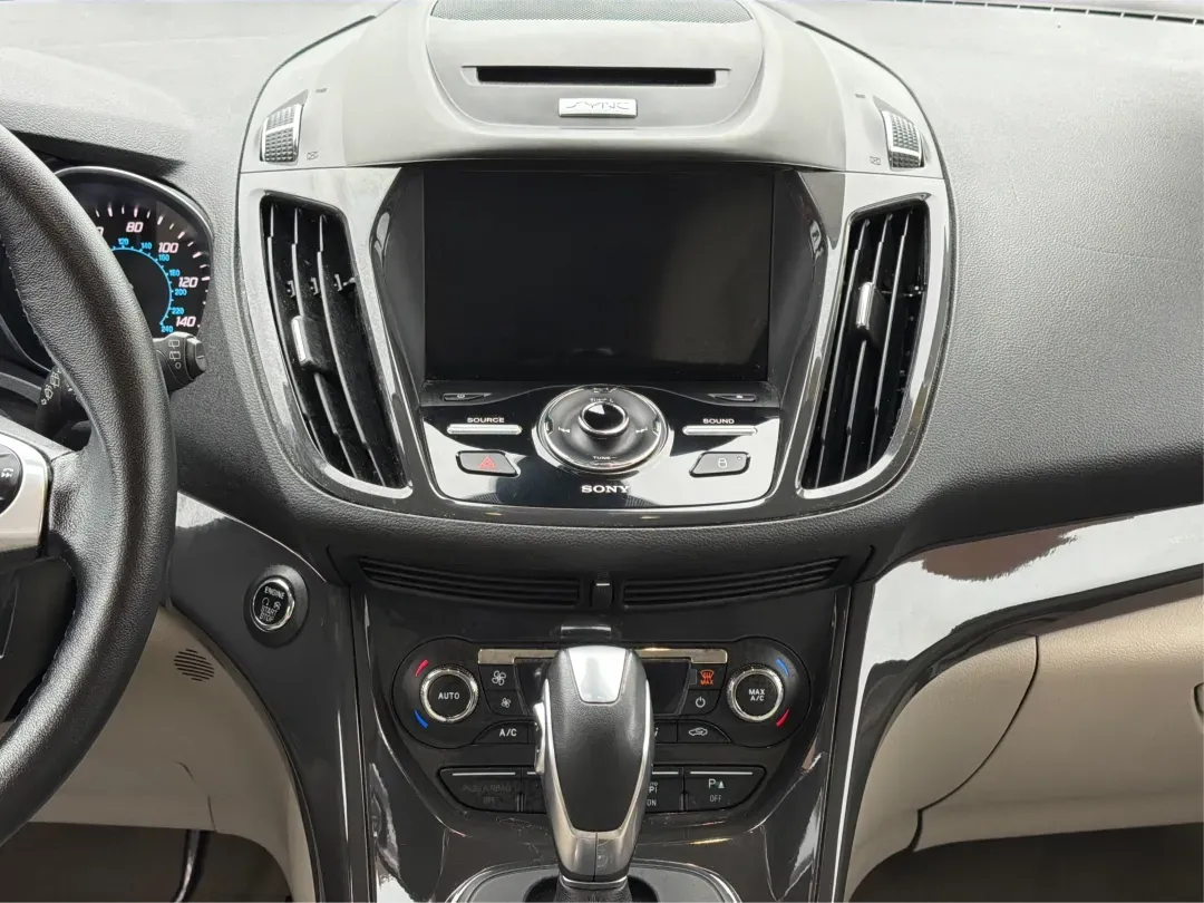 2016 Ford Escape Titanium (1FMCU0J94GU) with an 2.0L L4 DOHC 16V engine, 6-Speed Automatic transmission, located at 1184 Kauffman Ave, Fairborn, OH, 45324, (937) 908-9800, 39.807072, -84.030914 - **Explore New Adventures with the 2016 Ford Escape Titanium Perfect for Families and Commuters Alike!**<br /> <br /> Are you ready to elevate your driving experience? The 2016 Ford Escape Titanium is the ideal companion for both bustling family life and daily commutes, bringing together style, comf - Photo#13