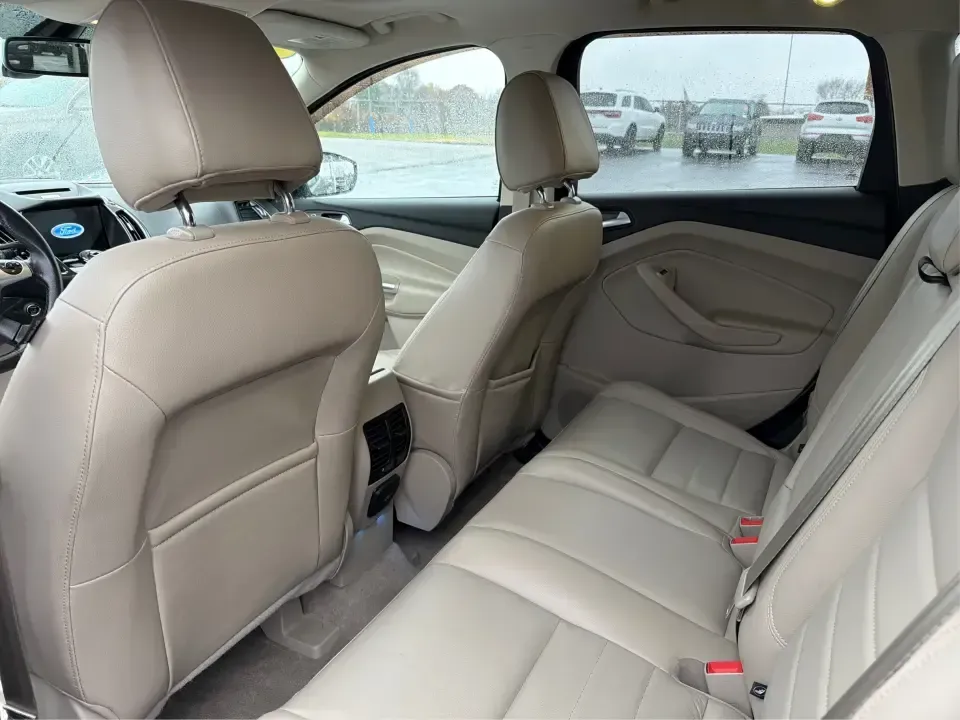 2016 Ford Escape Titanium (1FMCU0J94GU) with an 2.0L L4 DOHC 16V engine, 6-Speed Automatic transmission, located at 8750 N County Rd 25A, Piqua, OH, 45356, (937) 908-9800, 40.164391, -84.232513 - **Explore New Adventures with the 2016 Ford Escape Titanium Perfect for Families and Commuters Alike!**<br /> <br /> Are you ready to elevate your driving experience? The 2016 Ford Escape Titanium is the ideal companion for both bustling family life and daily commutes, bringing together style, comf - Photo#10