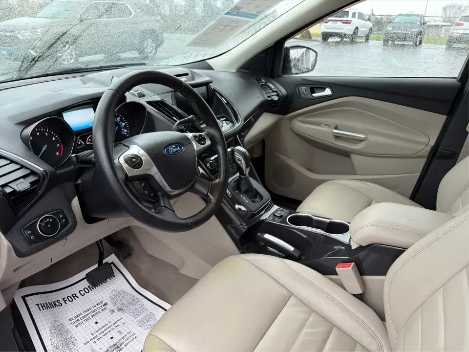 2016 Ford Escape Titanium (1FMCU0J94GU) with an 2.0L L4 DOHC 16V engine, 6-Speed Automatic transmission, located at 401 Woodman Dr, Riverside, OH, 45431, (937) 908-9800, 39.760899, -84.123421 - **Explore New Adventures with the 2016 Ford Escape Titanium Perfect for Families and Commuters Alike!**<br /> <br /> Are you ready to elevate your driving experience? The 2016 Ford Escape Titanium is the ideal companion for both bustling family life and daily commutes, bringing together style, comf - Photo#9