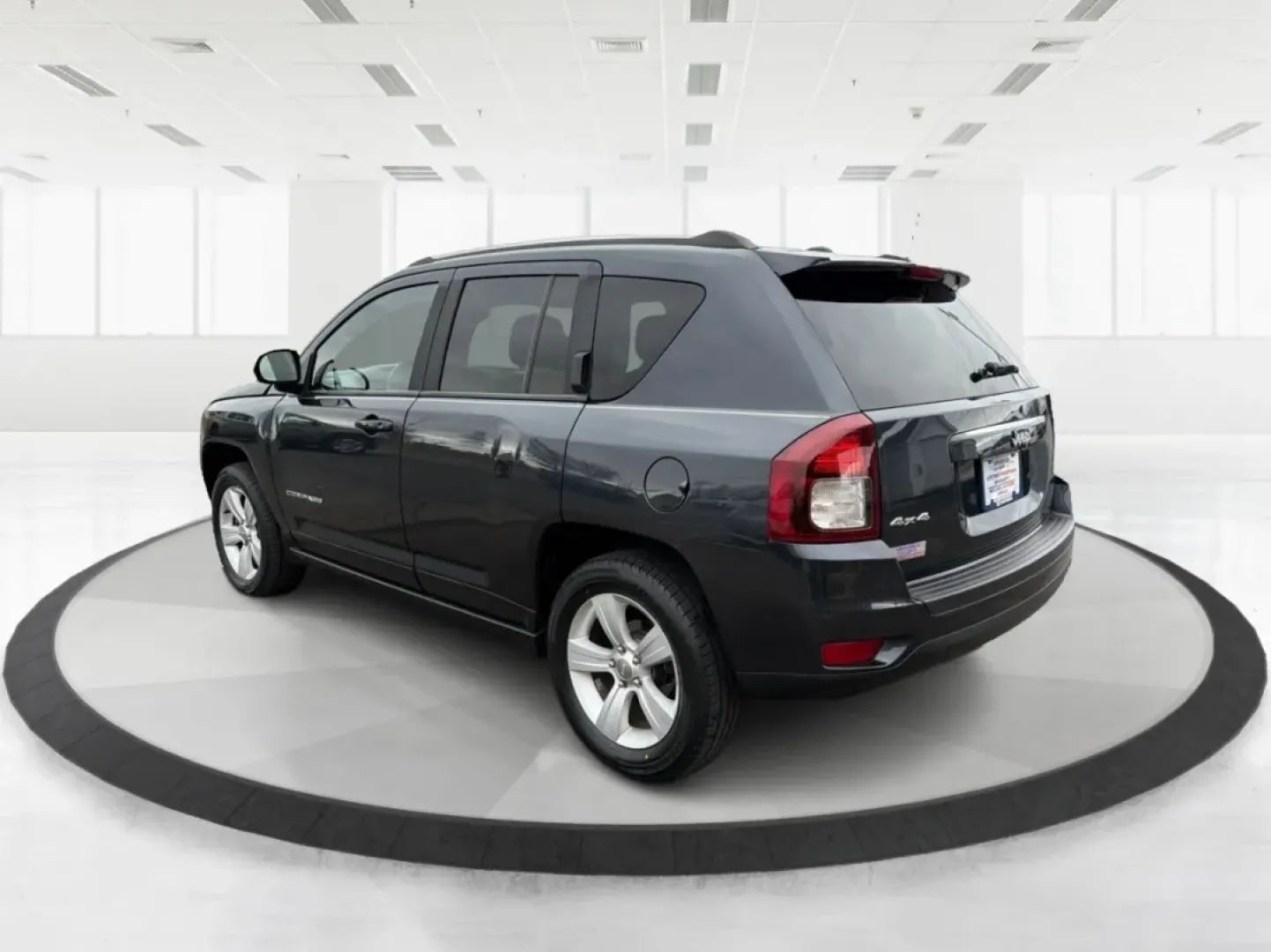 2014 Jeep Compass Latitude (1C4NJDEB3ED) with an 2.4L I-4 DOHC engine, located at 1951 S Dayton Lakeview Rd., New Carlisle, OH, 45344, (937) 908-9800, 39.890999, -84.050255 - ### Explore the Open Road with Confidence in the 2014 Jeep Compass Latitude!<br /> <br /> Are you ready to embrace the freedom of adventure? The 2014 Jeep Compass Latitude is the perfect vehicle for those who crave a blend of rugged capability and family-friendly comfort. Whether you're planning a w - Photo#4