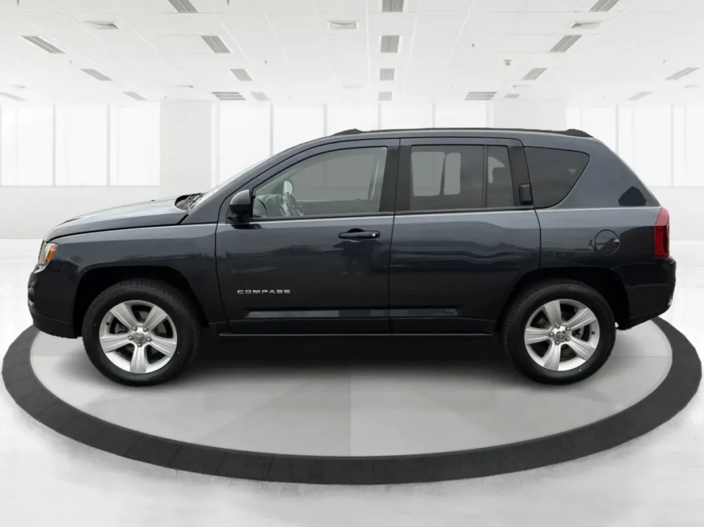 2014 Jeep Compass Latitude (1C4NJDEB3ED) with an 2.4L I-4 DOHC engine, located at 1951 S Dayton Lakeview Rd., New Carlisle, OH, 45344, (937) 908-9800, 39.890999, -84.050255 - ### Explore the Open Road with Confidence in the 2014 Jeep Compass Latitude!<br /> <br /> Are you ready to embrace the freedom of adventure? The 2014 Jeep Compass Latitude is the perfect vehicle for those who crave a blend of rugged capability and family-friendly comfort. Whether you're planning a w - Photo#5