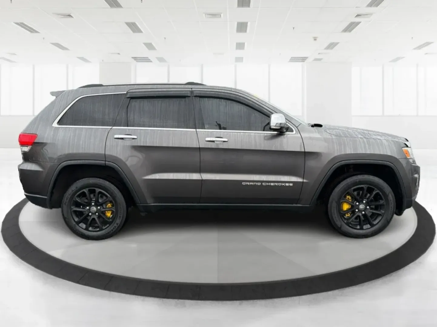 2014 Jeep Grand Cherokee Limited (1C4RJFBG9EC) with an Other engine, located at 880 E. National Road, Vandalia, OH, 45377, (937) 908-9800, 39.891918, -84.183594 - **Adventure Awaits: Drive Home a 2014 Jeep Grand Cherokee Limited Today!**<br /> <br /> Are you ready to elevate your driving experience? Picture yourself and your loved ones embarking on weekend getaways or daily commutes in the rugged yet refined 2014 Jeep Grand Cherokee Limited. This SUV isn't ju - Photo#1