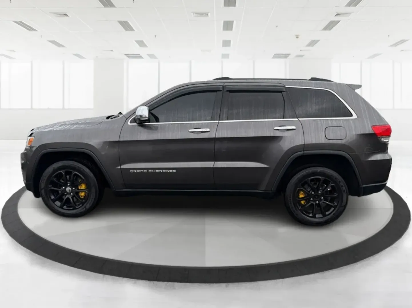 2014 Jeep Grand Cherokee Limited (1C4RJFBG9EC) with an Other engine, located at 880 E. National Road, Vandalia, OH, 45377, (937) 908-9800, 39.891918, -84.183594 - **Adventure Awaits: Drive Home a 2014 Jeep Grand Cherokee Limited Today!**<br /> <br /> Are you ready to elevate your driving experience? Picture yourself and your loved ones embarking on weekend getaways or daily commutes in the rugged yet refined 2014 Jeep Grand Cherokee Limited. This SUV isn't ju - Photo#5