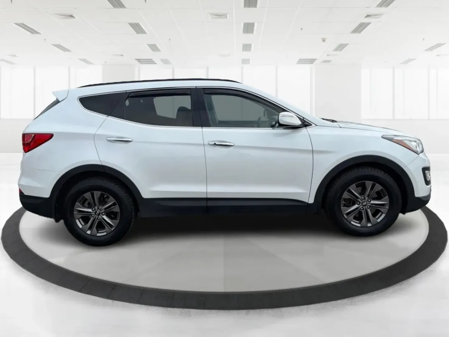 2014 Hyundai Santa Fe 2.4L (5XYZUDLB7EG) with an Theta II 2.4L I-4 gasoline direct injection engine, located at 1099 N County Rd 25A , Troy, OH, 45373, (937) 908-9800, 40.057079, -84.212883 - **Explore the Open Road with Ease: 2014 Hyundai Santa Fe at Advantage Car and Credit - Troy**<br /> <br /> Are you ready to take your family adventures to the next level? The 2014 Hyundai Santa Fe is designed for those seeking comfort, style, and ample space for everything life throws your way-perfe - Photo#1