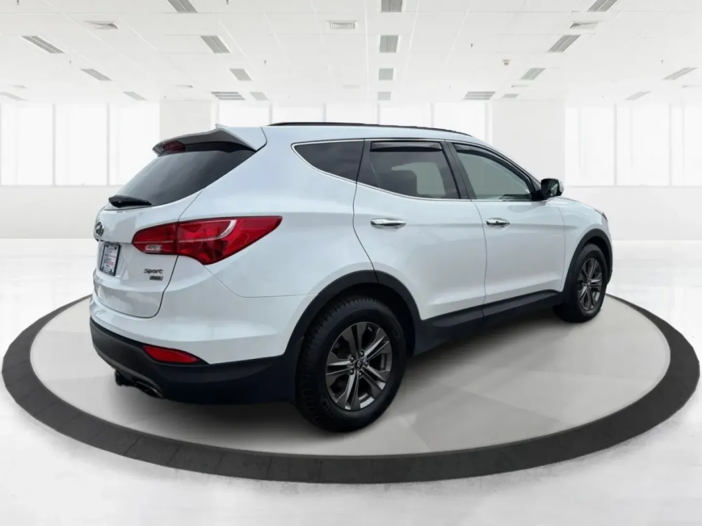 2014 Hyundai Santa Fe 2.4L (5XYZUDLB7EG) with an Theta II 2.4L I-4 gasoline direct injection engine, located at 1099 N County Rd 25A , Troy, OH, 45373, (937) 908-9800, 40.057079, -84.212883 - **Explore the Open Road with Ease: 2014 Hyundai Santa Fe at Advantage Car and Credit - Troy**<br /> <br /> Are you ready to take your family adventures to the next level? The 2014 Hyundai Santa Fe is designed for those seeking comfort, style, and ample space for everything life throws your way-perfe - Photo#2