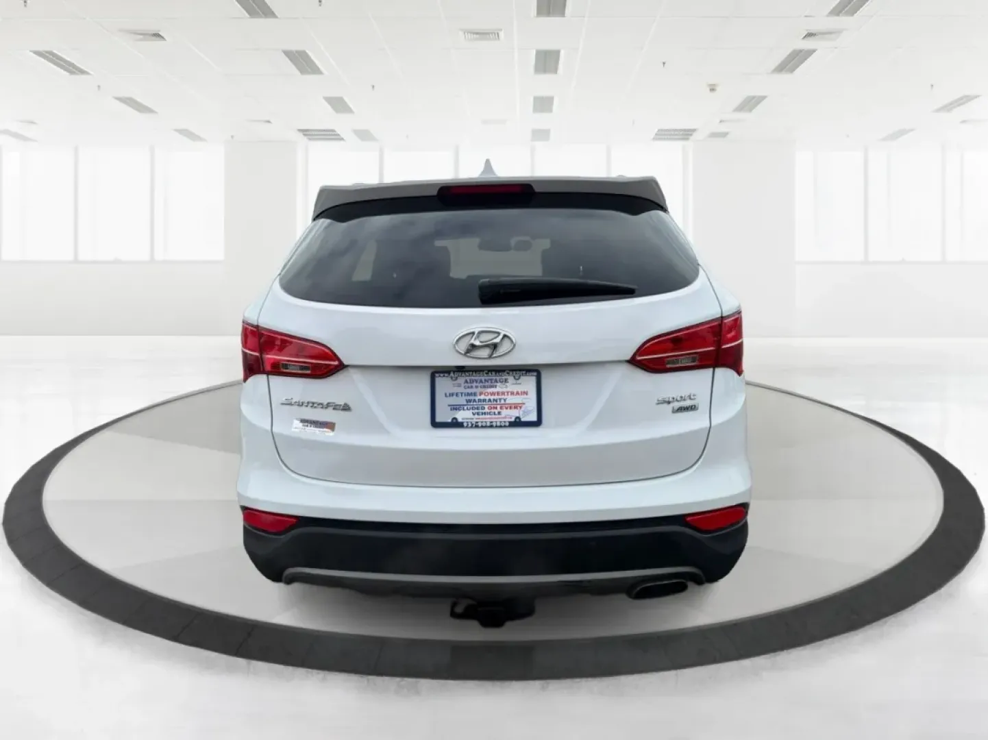 2014 Hyundai Santa Fe 2.4L (5XYZUDLB7EG) with an Theta II 2.4L I-4 gasoline direct injection engine, located at 1099 N County Rd 25A , Troy, OH, 45373, (937) 908-9800, 40.057079, -84.212883 - **Explore the Open Road with Ease: 2014 Hyundai Santa Fe at Advantage Car and Credit - Troy**<br /> <br /> Are you ready to take your family adventures to the next level? The 2014 Hyundai Santa Fe is designed for those seeking comfort, style, and ample space for everything life throws your way-perfe - Photo#3