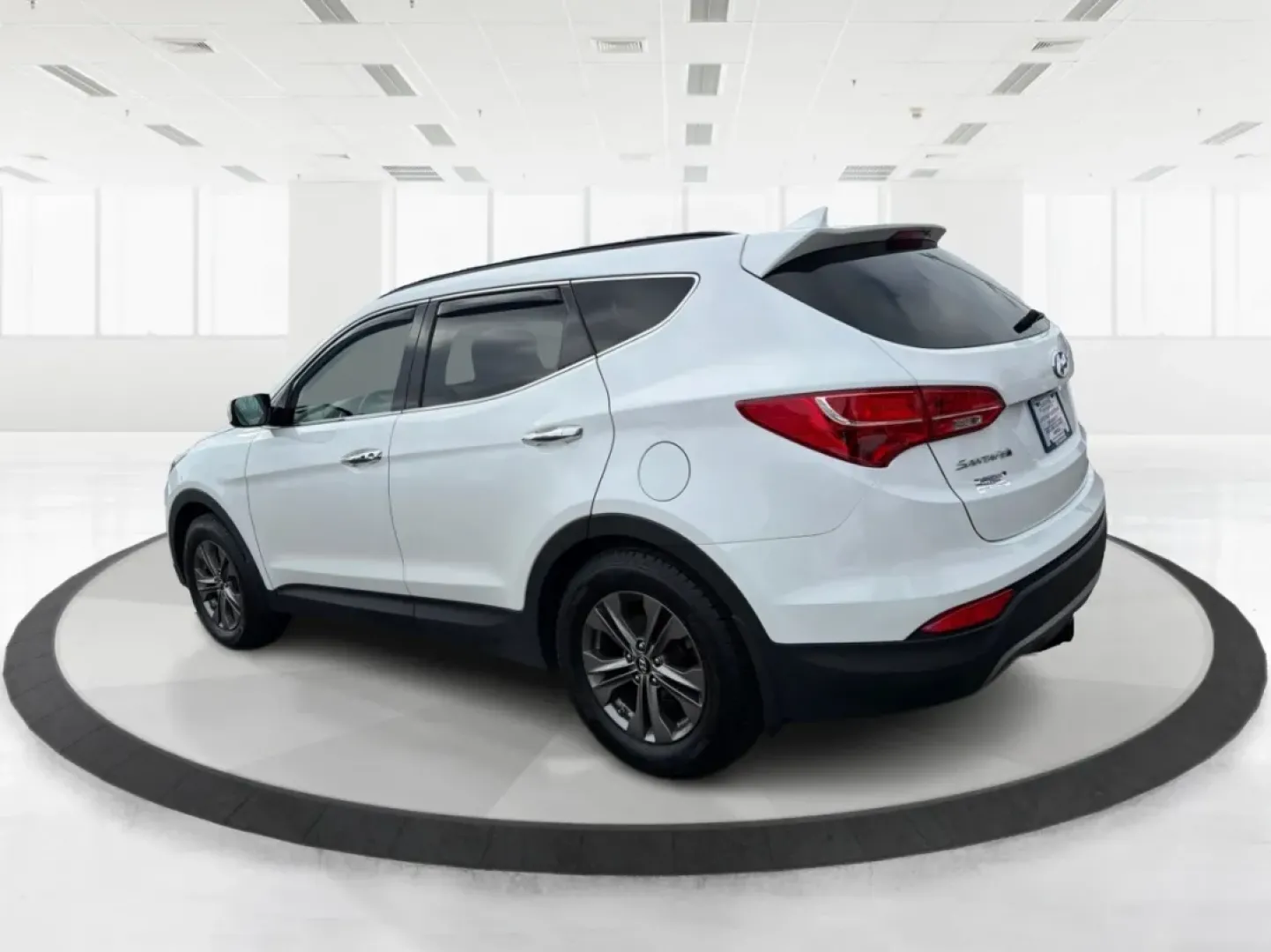 2014 Hyundai Santa Fe 2.4L (5XYZUDLB7EG) with an Theta II 2.4L I-4 gasoline direct injection engine, located at 1099 N County Rd 25A , Troy, OH, 45373, (937) 908-9800, 40.057079, -84.212883 - **Explore the Open Road with Ease: 2014 Hyundai Santa Fe at Advantage Car and Credit - Troy**<br /> <br /> Are you ready to take your family adventures to the next level? The 2014 Hyundai Santa Fe is designed for those seeking comfort, style, and ample space for everything life throws your way-perfe - Photo#4