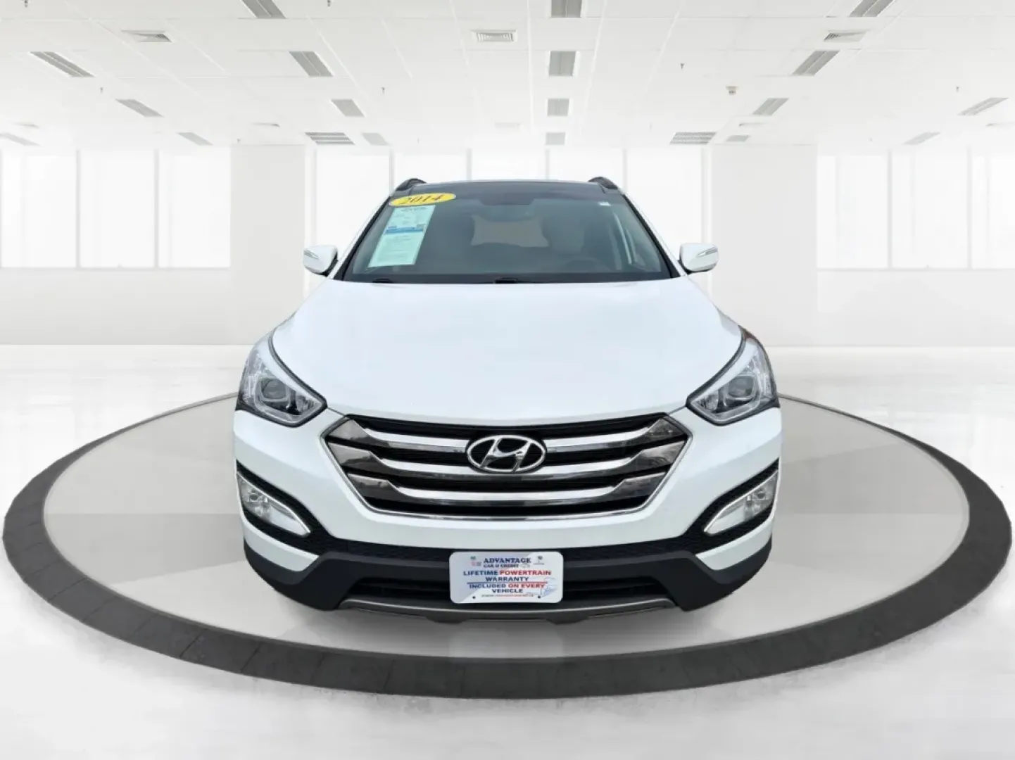 2014 Hyundai Santa Fe 2.4L (5XYZUDLB7EG) with an Theta II 2.4L I-4 gasoline direct injection engine, located at 1099 N County Rd 25A , Troy, OH, 45373, (937) 908-9800, 40.057079, -84.212883 - **Explore the Open Road with Ease: 2014 Hyundai Santa Fe at Advantage Car and Credit - Troy**<br /> <br /> Are you ready to take your family adventures to the next level? The 2014 Hyundai Santa Fe is designed for those seeking comfort, style, and ample space for everything life throws your way-perfe - Photo#7