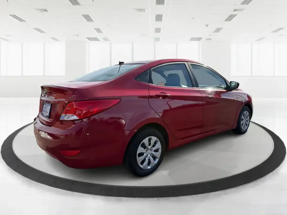 2016 Hyundai Accent SE (KMHCT4AE7GU) with an 1.6L I-4 gasoline direct injection engine, 6A transmission, located at 880 E. National Road, Vandalia, OH, 45377, (937) 908-9800, 39.891918, -84.183594 - Need a smart, budget-friendly commuter that still feels comfortable for everyday life around Vandalia and the Dayton area? This **2016 Hyundai Accent SE** in **Boston Red Metallic** is a practical sedan for busy schedules-perfect for the daily run up **I75**, quick errands along **E. National Road** - Photo#2