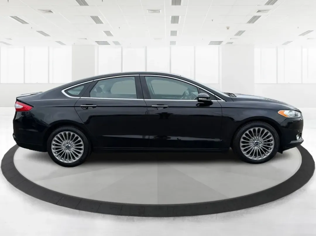 2016 Ford Fusion Titanium (3FA6P0D99GR) with an EcoBoost 2L I-4 gasoline direct injection engine, located at 8750 N County Rd 25A, Piqua, OH, 45356, (937) 908-9800, 40.164391, -84.232513 - 2016 Ford Fusion Titanium - Photo#1