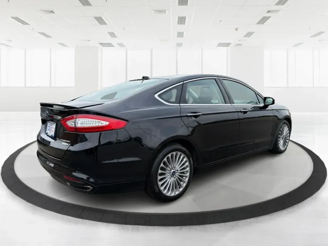2016 Ford Fusion Titanium (3FA6P0D99GR) with an EcoBoost 2L I-4 gasoline direct injection engine, located at 8750 N County Rd 25A, Piqua, OH, 45356, (937) 908-9800, 40.164391, -84.232513 - 2016 Ford Fusion Titanium - Photo#2