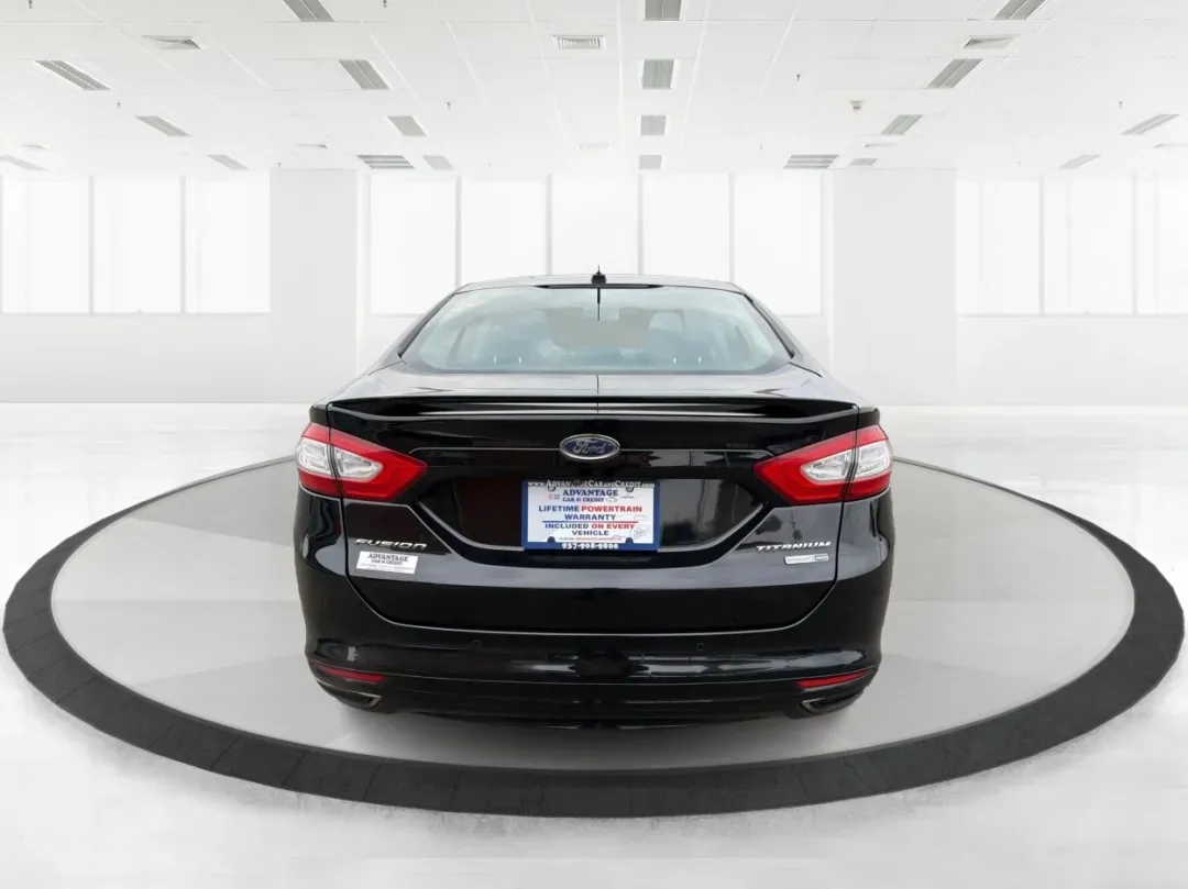 2016 Ford Fusion Titanium (3FA6P0D99GR) with an EcoBoost 2L I-4 gasoline direct injection engine, located at 8750 N County Rd 25A, Piqua, OH, 45356, (937) 908-9800, 40.164391, -84.232513 - 2016 Ford Fusion Titanium - Photo#3