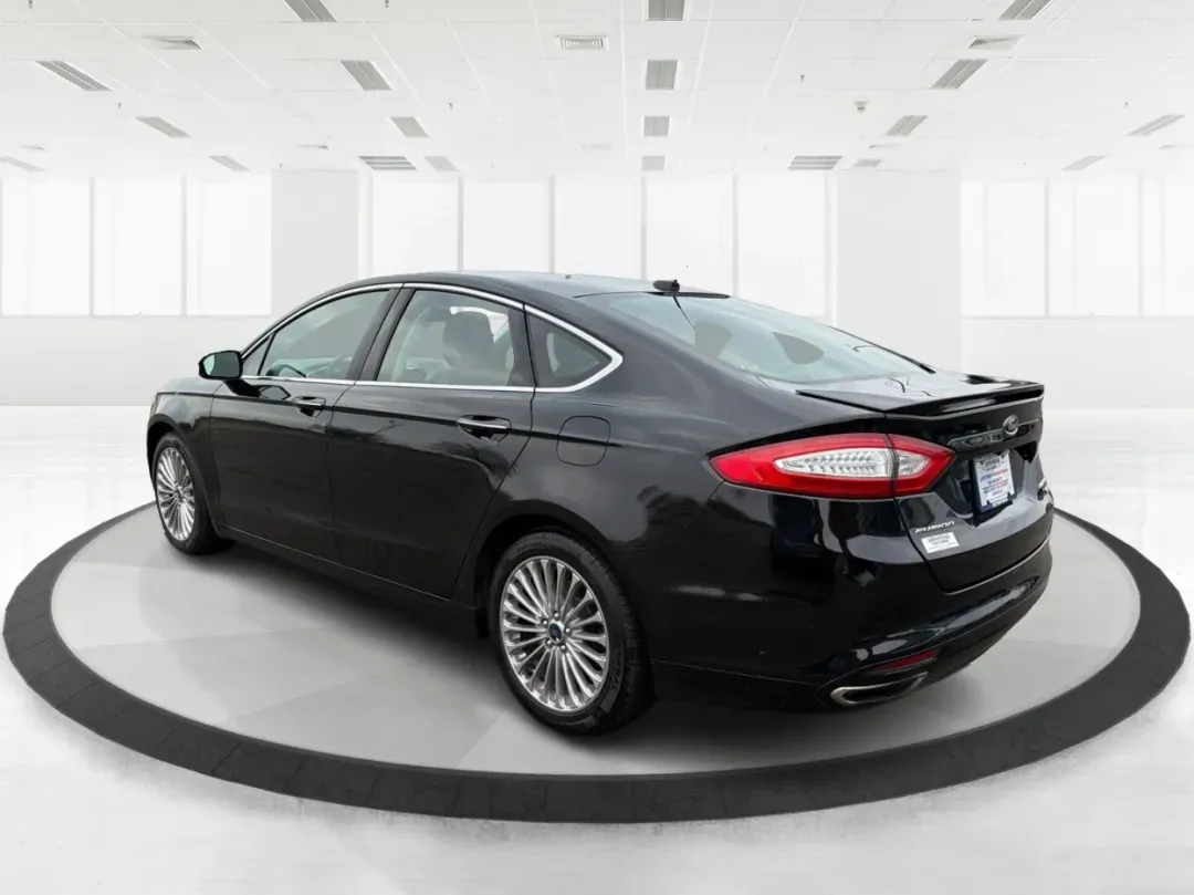 2016 Ford Fusion Titanium (3FA6P0D99GR) with an EcoBoost 2L I-4 gasoline direct injection engine, located at 8750 N County Rd 25A, Piqua, OH, 45356, (937) 908-9800, 40.164391, -84.232513 - 2016 Ford Fusion Titanium - Photo#4