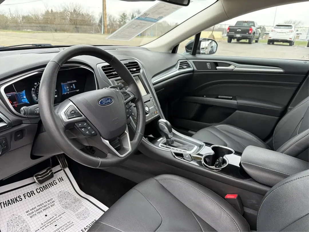 2016 Ford Fusion Titanium (3FA6P0D99GR) with an EcoBoost 2L I-4 gasoline direct injection engine, located at 8750 N County Rd 25A, Piqua, OH, 45356, (937) 908-9800, 40.164391, -84.232513 - 2016 Ford Fusion Titanium - Photo#9