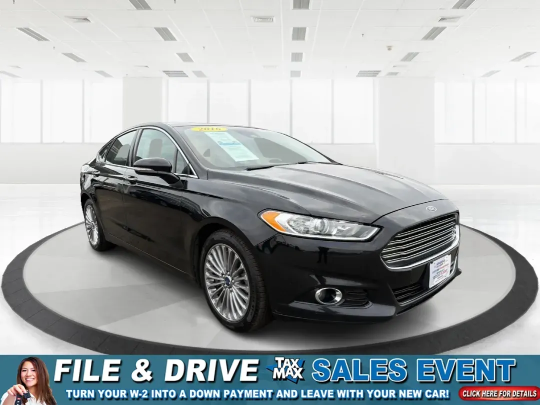 2016 Ford Fusion Titanium (3FA6P0D99GR) with an EcoBoost 2L I-4 gasoline direct injection engine, located at 8750 N County Rd 25A, Piqua, OH, 45356, (937) 908-9800, 40.164391, -84.232513 - 2016 Ford Fusion Titanium - Photo#0