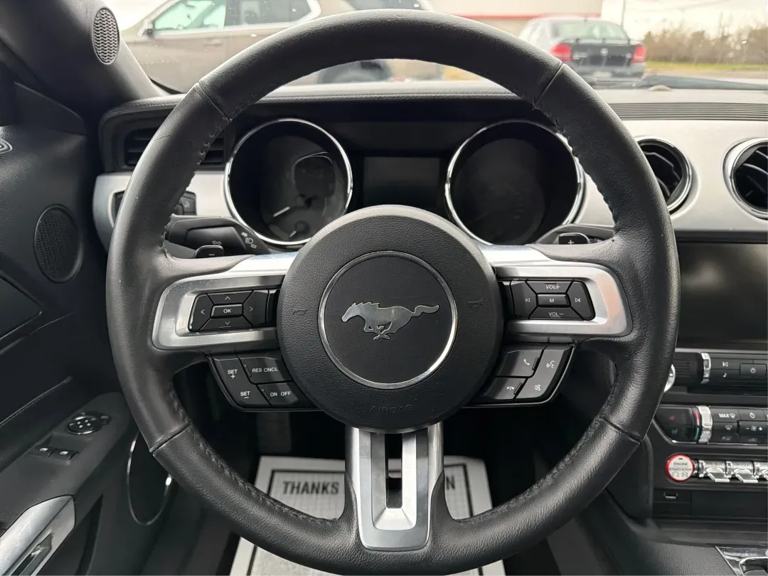 2015 Ford Mustang EcoBoost (1FA6P8TH2F5) with an EcoBoost 2.3L I-4 gasoline direct injection engine, located at 1951 S Dayton Lakeview Rd., New Carlisle, OH, 45344, (937) 908-9800, 39.890999, -84.050255 - **Experience the Thrill of the Open Road with this 2015 Ford Mustang EcoBoost!** <br /> <br /> Are you ready to elevate your driving experience? Whether you're looking for a weekend thrill, a stylish daily driver, or a statement-making vehicle for cruising around New Carlisle, OH, this 2015 Ford Mus - Photo#8