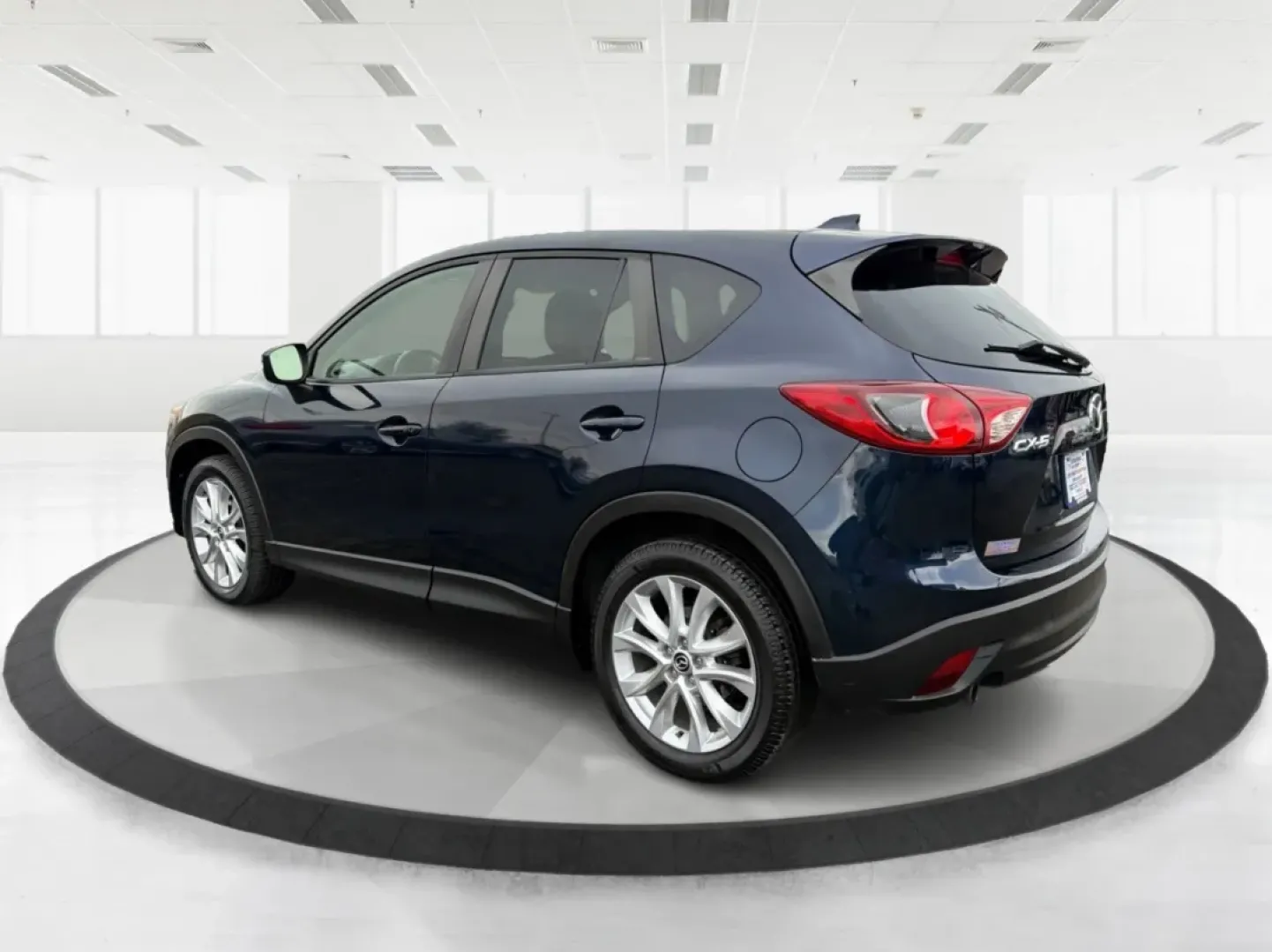 2015 Mazda CX-5 Grand Touring (JM3KE2DY9F0) with an SKYACTIV-G 2.5L I-4 gasoline direct injection engine, located at 1951 S Dayton Lakeview Rd., New Carlisle, OH, 45344, (937) 908-9800, 39.890999, -84.050255 - **Discover Adventure with the 2015 Mazda CX-5 at Advantage Car and Credit New Carlisle!**<br /> <br /> Are you ready to elevate your driving experience? Whether you're a growing family in need of space, a commuter looking for reliability, or an adventurer seeking the perfect weekend getaway vehicle - Photo#4
