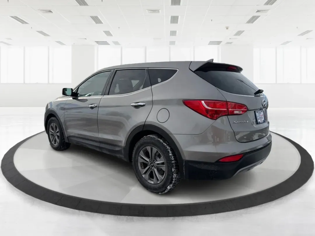 2016 Hyundai Santa Fe 2.4L (5XYZTDLB1GG) with an Theta II 2.4L I-4 gasoline direct injection engine, located at 1099 N County Rd 25A , Troy, OH, 45373, (937) 908-9800, 40.057079, -84.212883 - ### Embrace Your Adventurous Lifestyle with the 2016 Hyundai Santa Fe at Advantage Car and Credit - Troy!<br /> <br /> Are you ready to elevate your weekend escapes or daily commutes? Look no further than this stunning 2016 Hyundai Santa Fe, a versatile SUV designed for those who crave adventure and - Photo#4