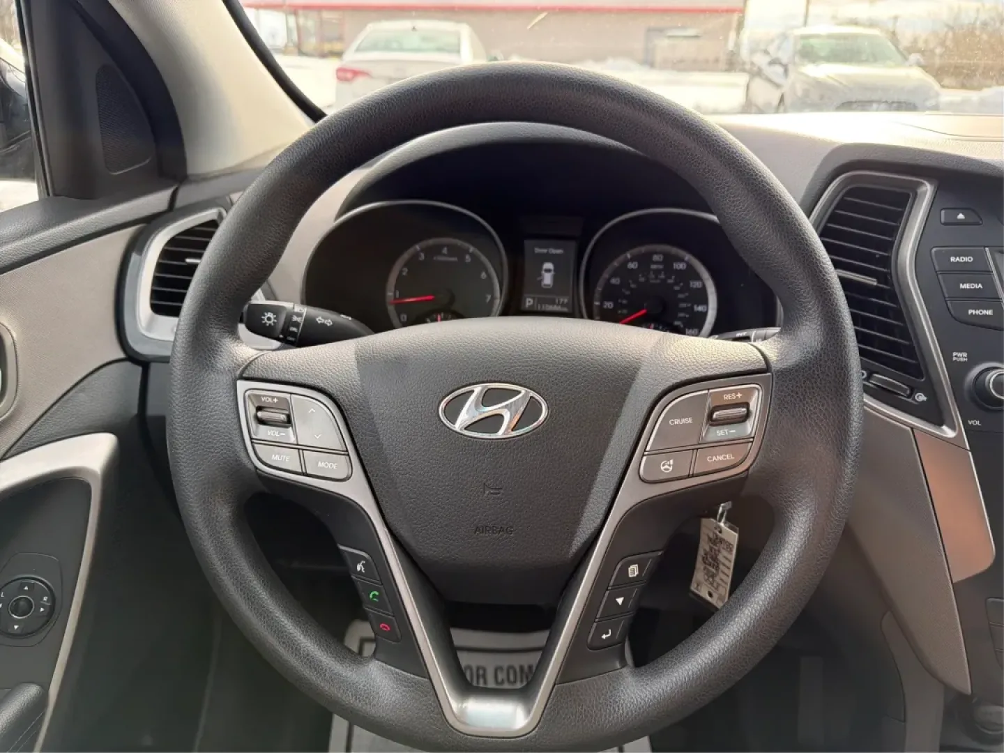 2016 Hyundai Santa Fe 2.4L (5XYZTDLB1GG) with an Theta II 2.4L I-4 gasoline direct injection engine, located at 1099 N County Rd 25A , Troy, OH, 45373, (937) 908-9800, 40.057079, -84.212883 - ### Embrace Your Adventurous Lifestyle with the 2016 Hyundai Santa Fe at Advantage Car and Credit - Troy!<br /> <br /> Are you ready to elevate your weekend escapes or daily commutes? Look no further than this stunning 2016 Hyundai Santa Fe, a versatile SUV designed for those who crave adventure and - Photo#16