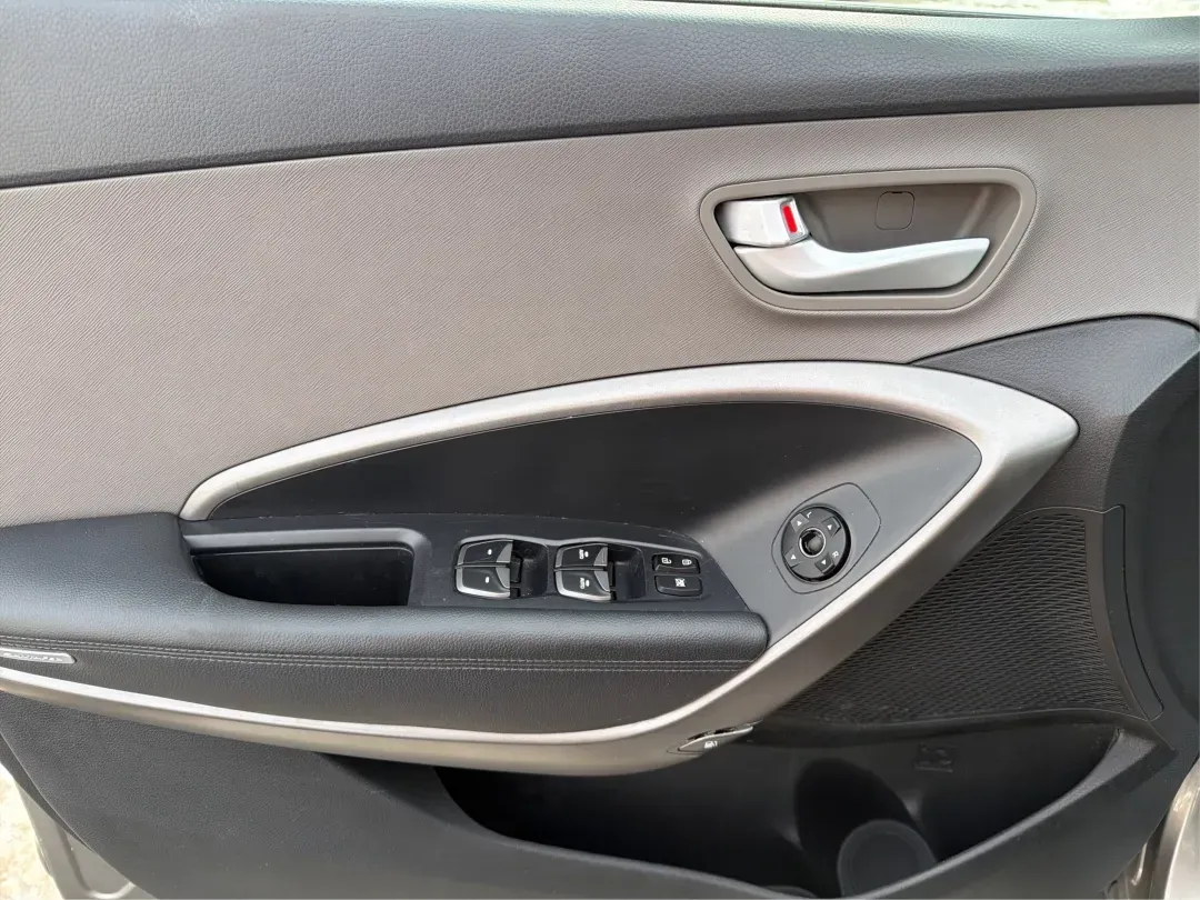 2016 Hyundai Santa Fe 2.4L (5XYZTDLB1GG) with an Theta II 2.4L I-4 gasoline direct injection engine, located at 1099 N County Rd 25A , Troy, OH, 45373, (937) 908-9800, 40.057079, -84.212883 - ### Embrace Your Adventurous Lifestyle with the 2016 Hyundai Santa Fe at Advantage Car and Credit - Troy!<br /> <br /> Are you ready to elevate your weekend escapes or daily commutes? Look no further than this stunning 2016 Hyundai Santa Fe, a versatile SUV designed for those who crave adventure and - Photo#17