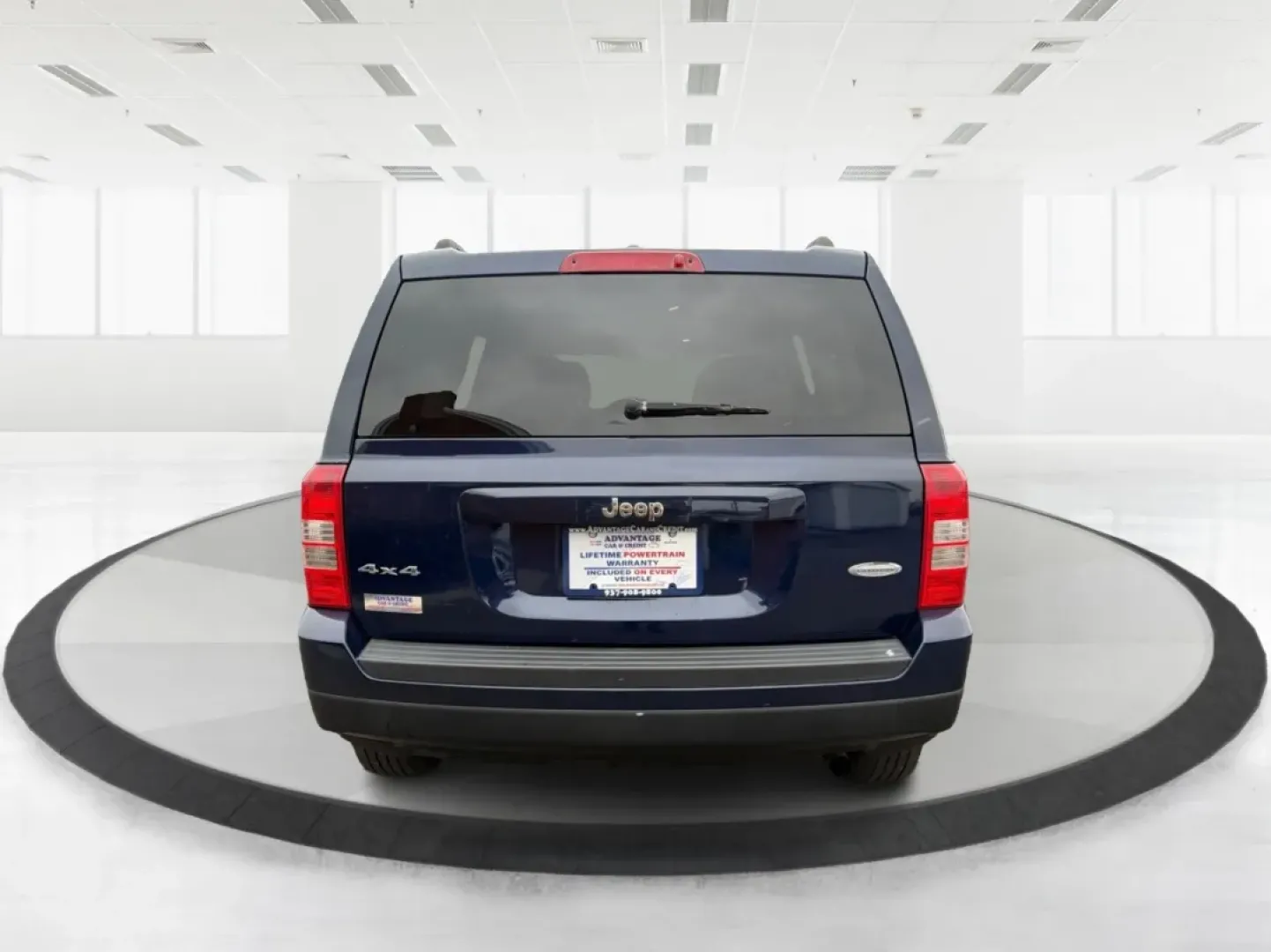 2014 Jeep Patriot Latitude (1C4NJRFB0ED) with an 2.4L I-4 DOHC engine, located at 1099 N County Rd 25A , Troy, OH, 45373, (937) 908-9800, 40.057079, -84.212883 - **Explore the Open Road in Style: 2014 Jeep Patriot Latitude at Advantage Car and Credit - Troy**<br /> <br /> Are you ready for your next adventure? The 2014 Jeep Patriot Latitude is the perfect vehicle for those who crave exploration and flexibility in their daily lives. Whether you're navigating - Photo#3