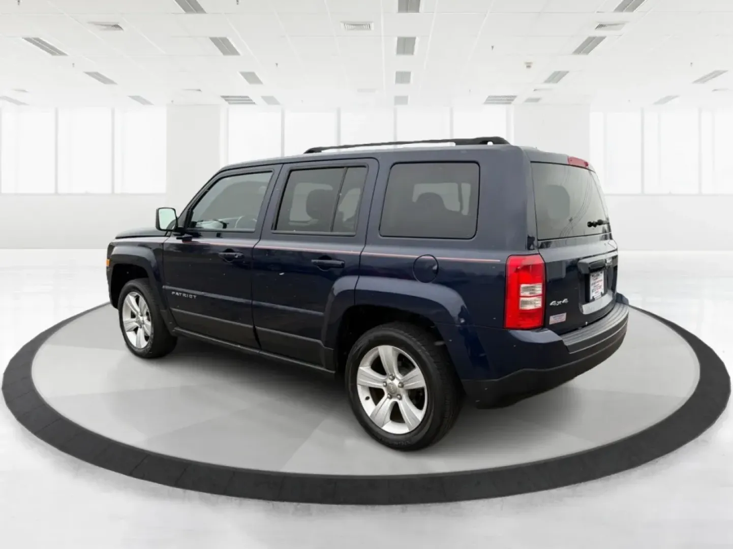 2014 Jeep Patriot Latitude (1C4NJRFB0ED) with an 2.4L I-4 DOHC engine, located at 1099 N County Rd 25A , Troy, OH, 45373, (937) 908-9800, 40.057079, -84.212883 - **Explore the Open Road in Style: 2014 Jeep Patriot Latitude at Advantage Car and Credit - Troy**<br /> <br /> Are you ready for your next adventure? The 2014 Jeep Patriot Latitude is the perfect vehicle for those who crave exploration and flexibility in their daily lives. Whether you're navigating - Photo#4