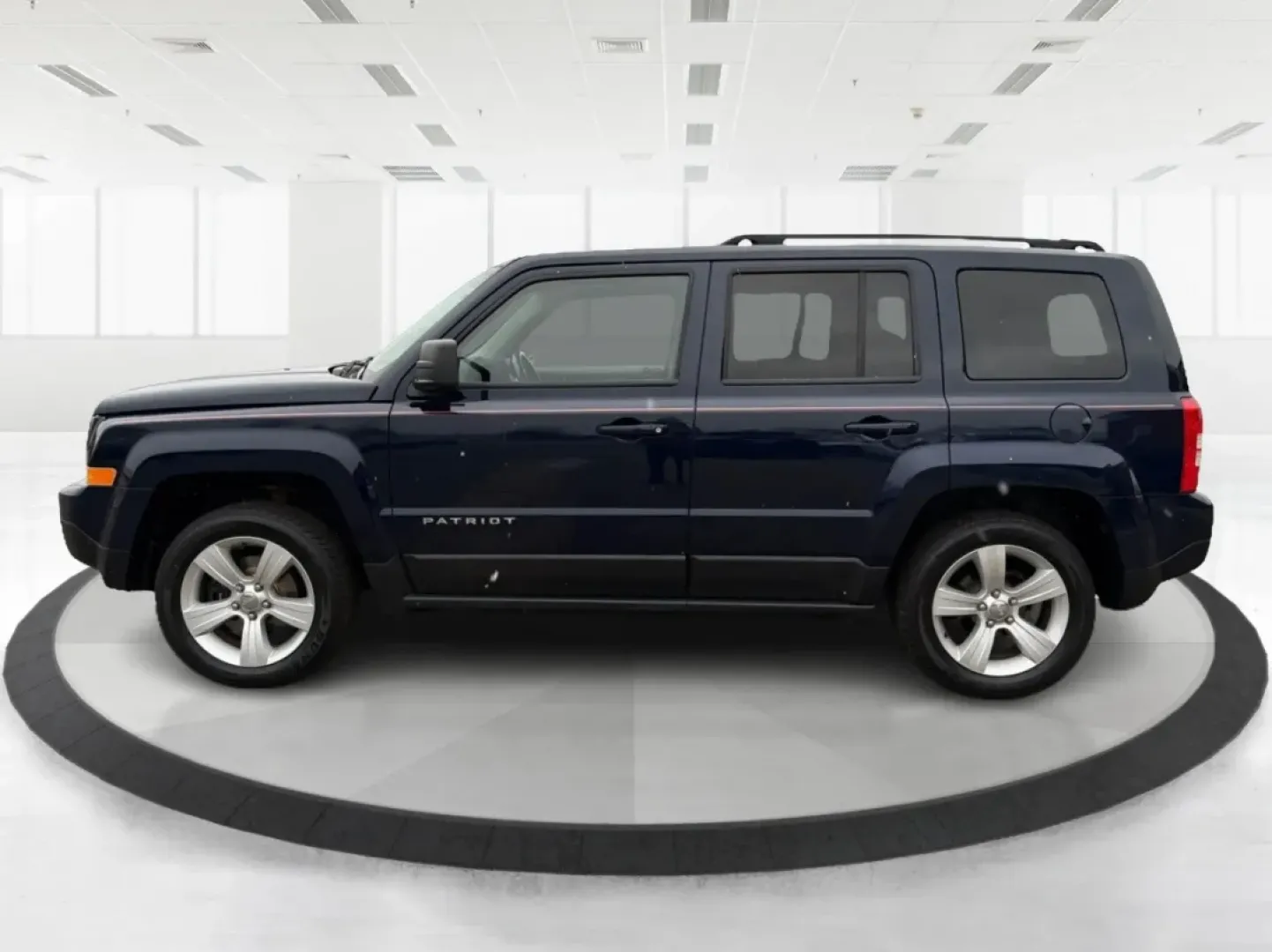 2014 Jeep Patriot Latitude (1C4NJRFB0ED) with an 2.4L I-4 DOHC engine, located at 1099 N County Rd 25A , Troy, OH, 45373, (937) 908-9800, 40.057079, -84.212883 - **Explore the Open Road in Style: 2014 Jeep Patriot Latitude at Advantage Car and Credit - Troy**<br /> <br /> Are you ready for your next adventure? The 2014 Jeep Patriot Latitude is the perfect vehicle for those who crave exploration and flexibility in their daily lives. Whether you're navigating - Photo#5