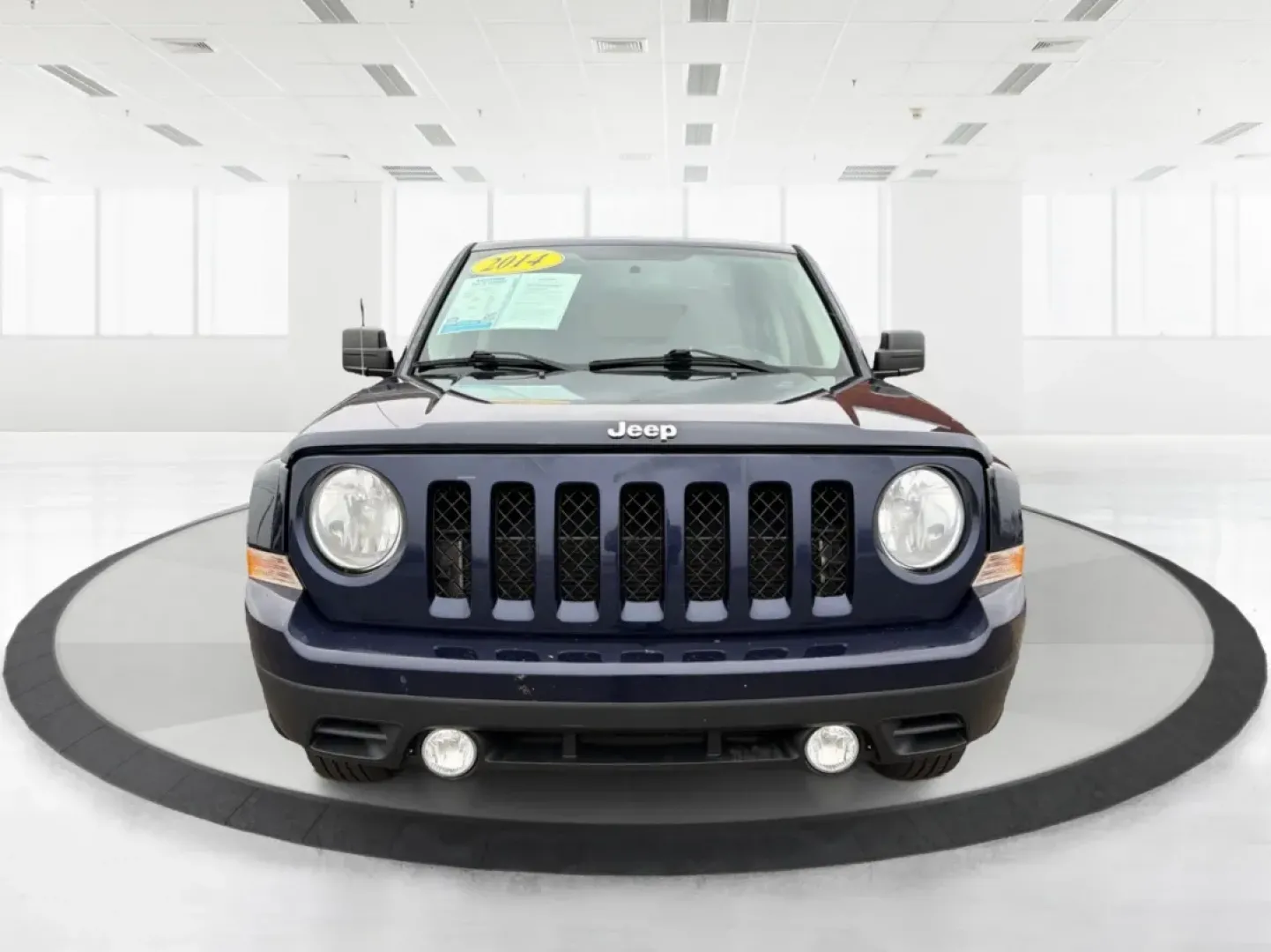 2014 Jeep Patriot Latitude (1C4NJRFB0ED) with an 2.4L I-4 DOHC engine, located at 1099 N County Rd 25A , Troy, OH, 45373, (937) 908-9800, 40.057079, -84.212883 - **Explore the Open Road in Style: 2014 Jeep Patriot Latitude at Advantage Car and Credit - Troy**<br /> <br /> Are you ready for your next adventure? The 2014 Jeep Patriot Latitude is the perfect vehicle for those who crave exploration and flexibility in their daily lives. Whether you're navigating - Photo#7