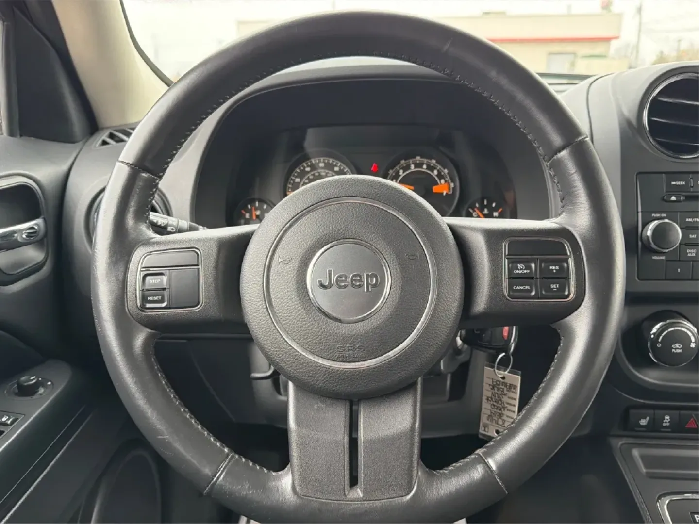 2014 Jeep Patriot Latitude (1C4NJRFB0ED) with an 2.4L I-4 DOHC engine, located at 1099 N County Rd 25A , Troy, OH, 45373, (937) 908-9800, 40.057079, -84.212883 - **Explore the Open Road in Style: 2014 Jeep Patriot Latitude at Advantage Car and Credit - Troy**<br /> <br /> Are you ready for your next adventure? The 2014 Jeep Patriot Latitude is the perfect vehicle for those who crave exploration and flexibility in their daily lives. Whether you're navigating - Photo#16