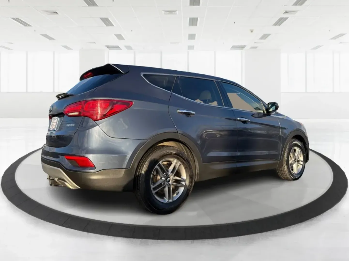 2017 Hyundai Santa Fe 2.4L (5NMZT3LBXHH) with an Theta II 2.4L I-4 gasoline direct injection engine, located at 880 E. National Road, Vandalia, OH, 45377, (937) 908-9800, 39.891918, -84.183594 - Discover your next adventure with the 2017 Hyundai Santa Fe, now available at Advantage Car and Credit in Vandalia, OH! This versatile SUV is perfect for families, commuters, and weekend adventurers alike. With seating for up to five and ample cargo space, it's ideal for everything from soccer pract - Photo#2