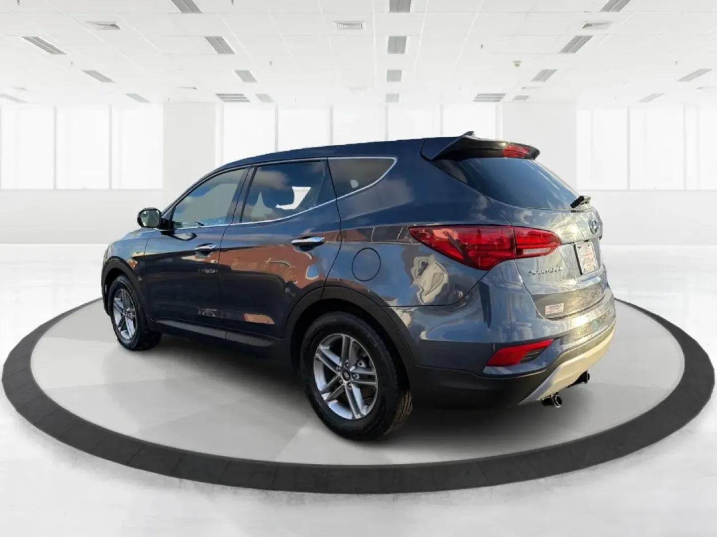 2017 Hyundai Santa Fe 2.4L (5NMZT3LBXHH) with an Theta II 2.4L I-4 gasoline direct injection engine, located at 880 E. National Road, Vandalia, OH, 45377, (937) 908-9800, 39.891918, -84.183594 - Discover your next adventure with the 2017 Hyundai Santa Fe, now available at Advantage Car and Credit in Vandalia, OH! This versatile SUV is perfect for families, commuters, and weekend adventurers alike. With seating for up to five and ample cargo space, it's ideal for everything from soccer pract - Photo#4