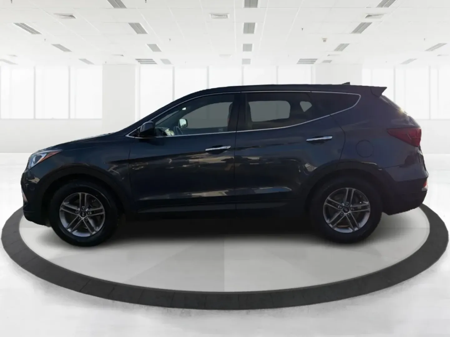 2017 Hyundai Santa Fe 2.4L (5NMZT3LBXHH) with an Theta II 2.4L I-4 gasoline direct injection engine, located at 880 E. National Road, Vandalia, OH, 45377, (937) 908-9800, 39.891918, -84.183594 - Discover your next adventure with the 2017 Hyundai Santa Fe, now available at Advantage Car and Credit in Vandalia, OH! This versatile SUV is perfect for families, commuters, and weekend adventurers alike. With seating for up to five and ample cargo space, it's ideal for everything from soccer pract - Photo#5