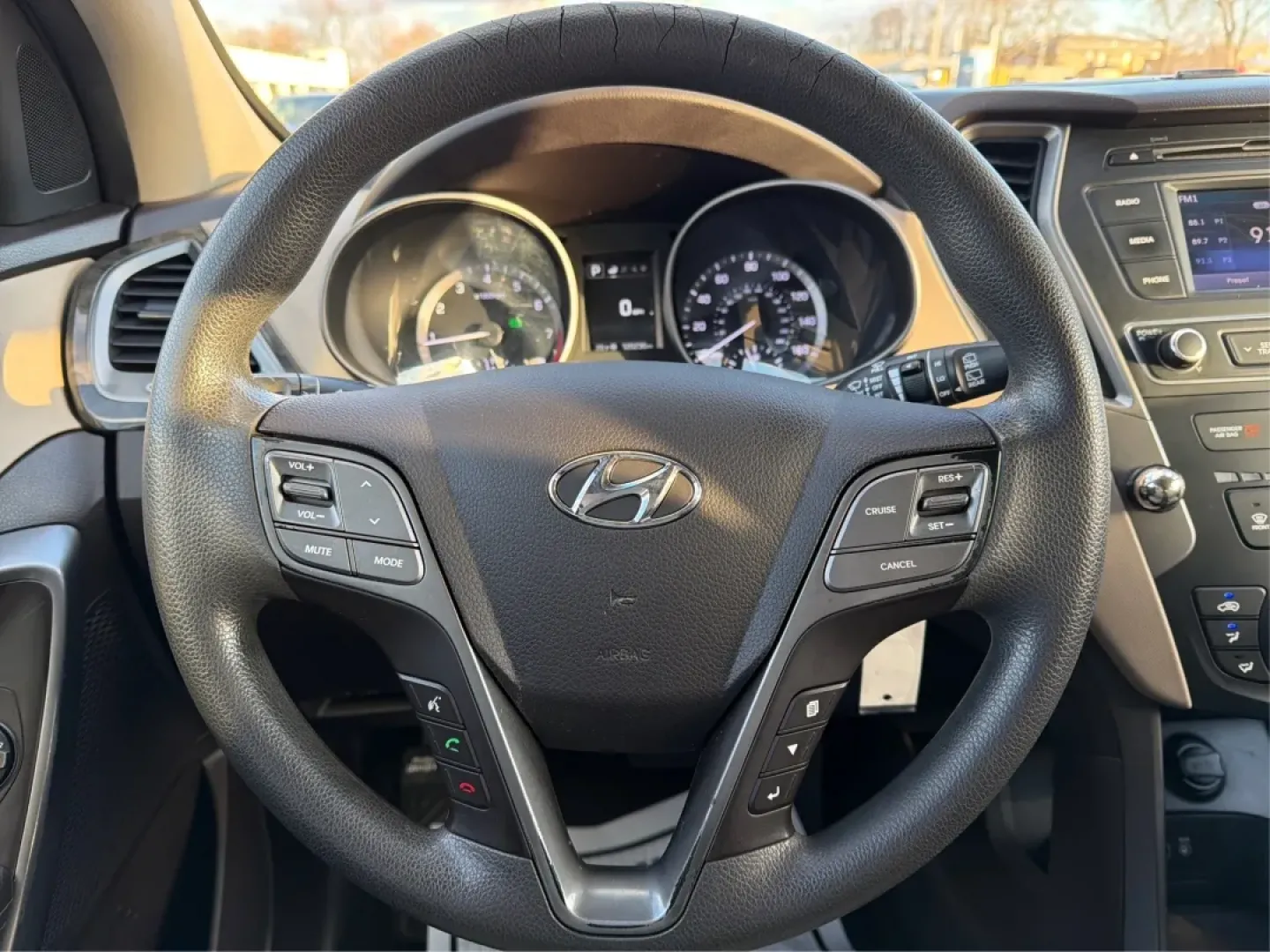 2017 Hyundai Santa Fe 2.4L (5NMZT3LBXHH) with an Theta II 2.4L I-4 gasoline direct injection engine, located at 880 E. National Road, Vandalia, OH, 45377, (937) 908-9800, 39.891918, -84.183594 - Discover your next adventure with the 2017 Hyundai Santa Fe, now available at Advantage Car and Credit in Vandalia, OH! This versatile SUV is perfect for families, commuters, and weekend adventurers alike. With seating for up to five and ample cargo space, it's ideal for everything from soccer pract - Photo#16