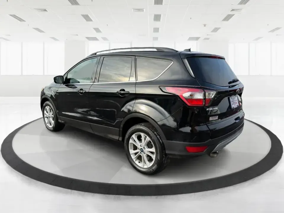 2018 Ford Escape SE (1FMCU9GD6JU) with an 1.5L L4 DOHC 16V engine, 6A transmission, located at 1184 Kauffman Ave, Fairborn, OH, 45324, (937) 908-9800, 39.807072, -84.030914 - Are you looking for the perfect vehicle that can handle your busy lifestyle while keeping you comfortable and safe? Look no further than this 2018 Ford Escape SE at Advantage Car and Credit in Piqua, OH. This versatile SUV is ideal for families on the go, weekend adventurers, and even commuters who - Photo#4