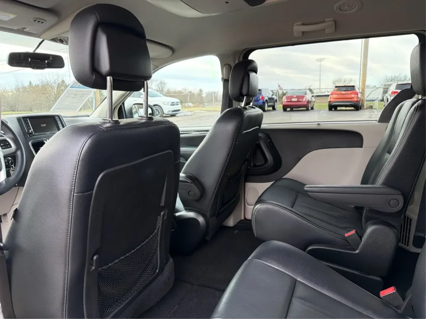 2015 Chrysler Town and Country Touring (2C4RC1BG4FR) with an 3.6L V-6 DOHC engine, located at 8750 N County Rd 25A, Piqua, OH, 45356, (937) 908-9800, 40.164391, -84.232513 - If you're searching for the perfect family vehicle that combines spaciousness, comfort, and advanced features, look no further than the 2015 Chrysler Town and Country Touring van available at Advantage Car and Credit in Piqua, OH. This passenger van is an ideal solution for growing families who ne - Photo#10