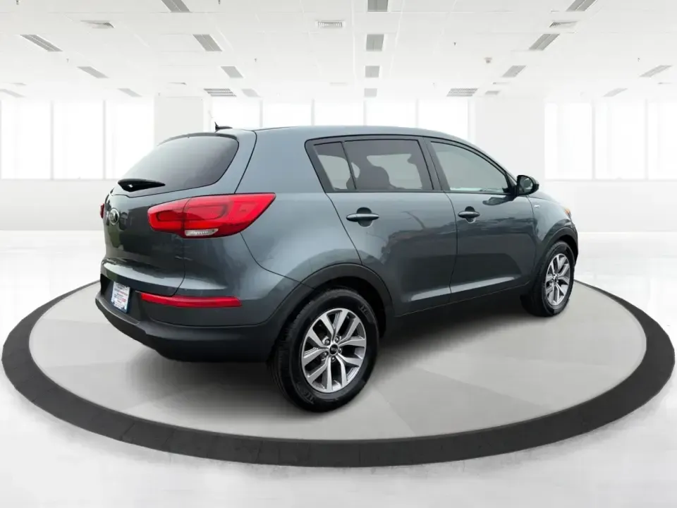 2015 Kia Sportage LX AWD (KNDPBCAC6F7) with an 2.4L V6 DOHC 24V engine, 6-Speed Automatic transmission, located at 4508 South Dixie Dr, Moraine, OH, 45439, (937) 908-9800, 39.689976, -84.218452 - Ready for weekend getaways to Caesar Creek, snowy school runs, or a daily commute down I75 and SR725? This **2015 Kia Sportage LX AWD** is the kind of practical crossover that fits real life in Moraine-easy to park, comfortable for five, and confident when the weather turns. Finished in **Mineral Si - Photo#2