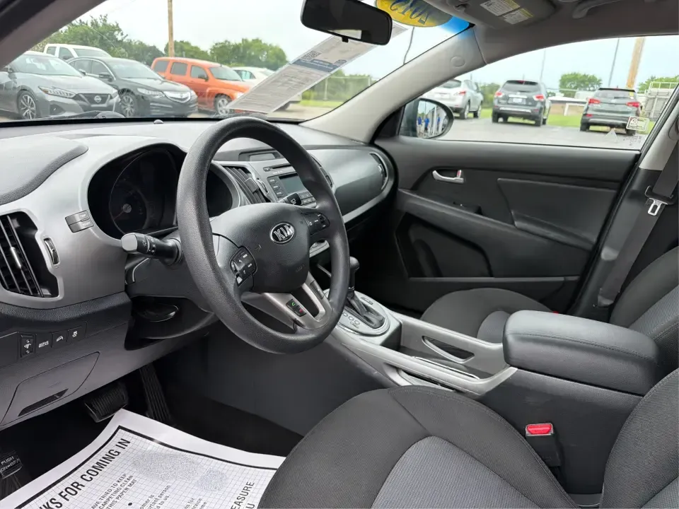 2015 Kia Sportage LX AWD (KNDPBCAC6F7) with an 2.4L V6 DOHC 24V engine, 6-Speed Automatic transmission, located at 4508 South Dixie Dr, Moraine, OH, 45439, (937) 908-9800, 39.689976, -84.218452 - Ready for weekend getaways to Caesar Creek, snowy school runs, or a daily commute down I75 and SR725? This **2015 Kia Sportage LX AWD** is the kind of practical crossover that fits real life in Moraine-easy to park, comfortable for five, and confident when the weather turns. Finished in **Mineral Si - Photo#9