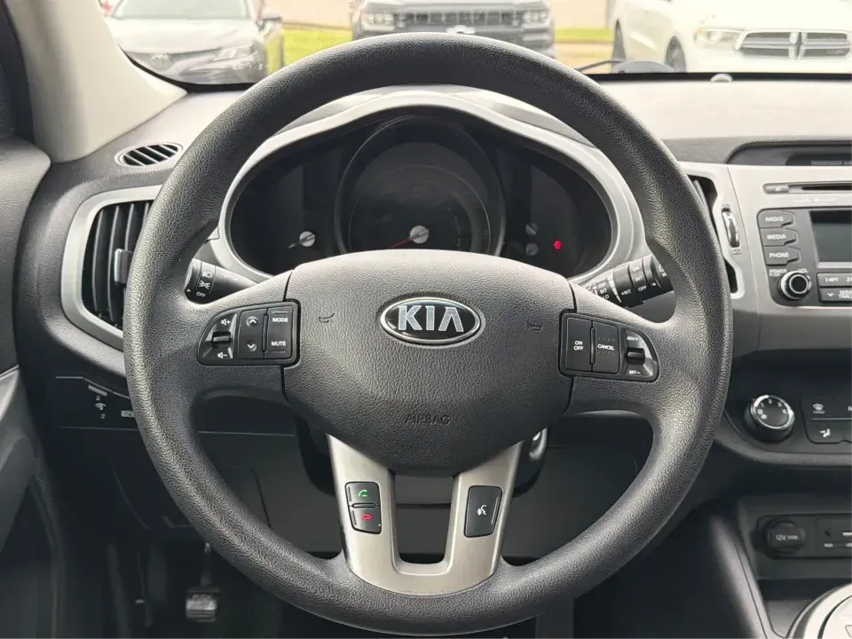 2015 Kia Sportage LX AWD (KNDPBCAC6F7) with an 2.4L V6 DOHC 24V engine, 6-Speed Automatic transmission, located at 4508 South Dixie Dr, Moraine, OH, 45439, (937) 908-9800, 39.689976, -84.218452 - Ready for weekend getaways to Caesar Creek, snowy school runs, or a daily commute down I75 and SR725? This **2015 Kia Sportage LX AWD** is the kind of practical crossover that fits real life in Moraine-easy to park, comfortable for five, and confident when the weather turns. Finished in **Mineral Si - Photo#16