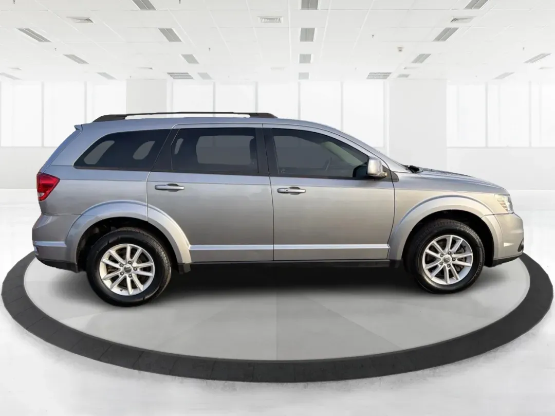 2017 Dodge Journey SXT AWD (3C4PDDBGXHT) with an Pentastar 3.6L V-6 DOHC engine, located at 880 E. National Road, Vandalia, OH, 45377, (937) 908-9800, 39.891918, -84.183594 - Are you ready to elevate your family adventures or tackle your daily commutes with style and confidence? Look no further than this exceptional **2017 Dodge Journey SXT AWD**. Perfectly suited for growing families or those who crave weekend getaways, this SUV combines versatility, comfort, and perfor - Photo#1