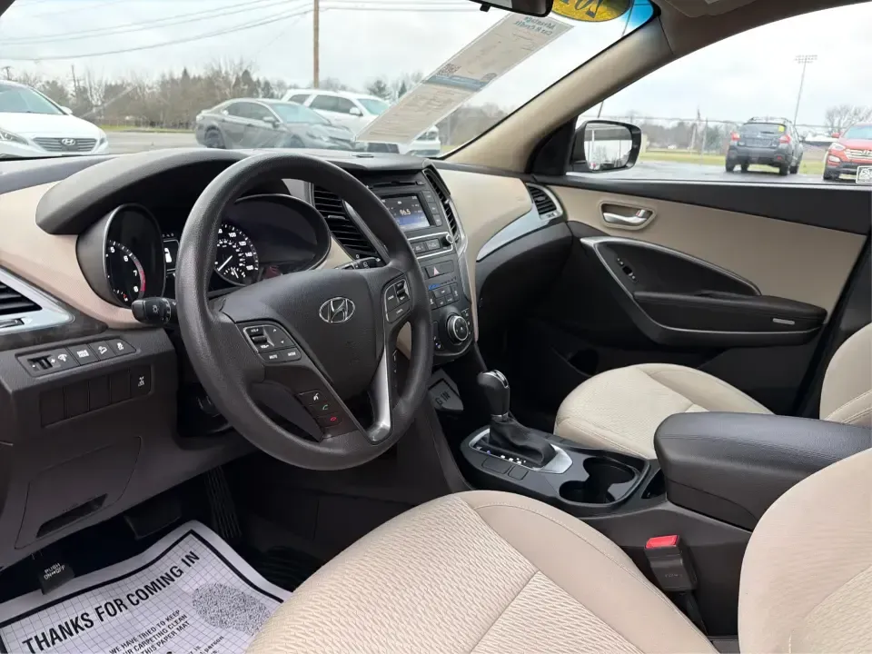 2017 Hyundai Santa Fe 2.4L (5NMZTDLB2HH) with an Theta II 2.4L I-4 gasoline direct injection engine, 6A transmission, located at 1951 S Dayton Lakeview Rd., New Carlisle, OH, 45344, (937) 908-9800, 39.890999, -84.050255 - **Elevate Your Family Adventures with the 2017 Hyundai Santa Fe at Advantage Car and Credit!**<br /> <br /> Are you searching for the perfect vehicle to accommodate your growing family or to enhance your weekend getaways? Look no further! The 2017 Hyundai Santa Fe is a versatile and spacious SUV des - Photo#9
