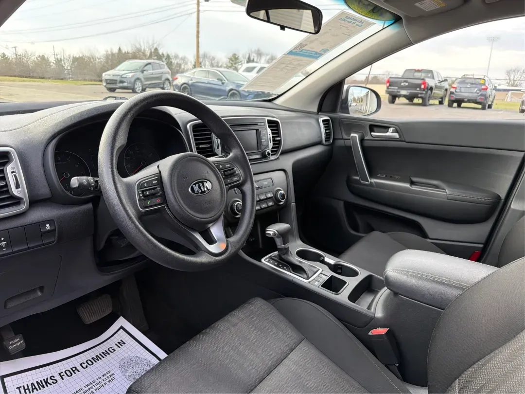 2017 Kia Sportage LX (KNDPMCAC2H7) with an Theta II 2.4L I-4 gasoline direct injection engine, 6A transmission, located at 1230 East Main St, Xenia, OH, 45385, (937) 908-9800, 39.688026, -83.910172 - **Adventure Awaits with the 2017 Kia Sportage LX at Advantage Car and Credit - Riverside!**<br /> <br /> Are you looking for a versatile crossover that seamlessly fits into your active lifestyle? The 2017 Kia Sportage LX is your ticket to weekend adventures, family road trips, and daily commutes. Wi - Photo#9