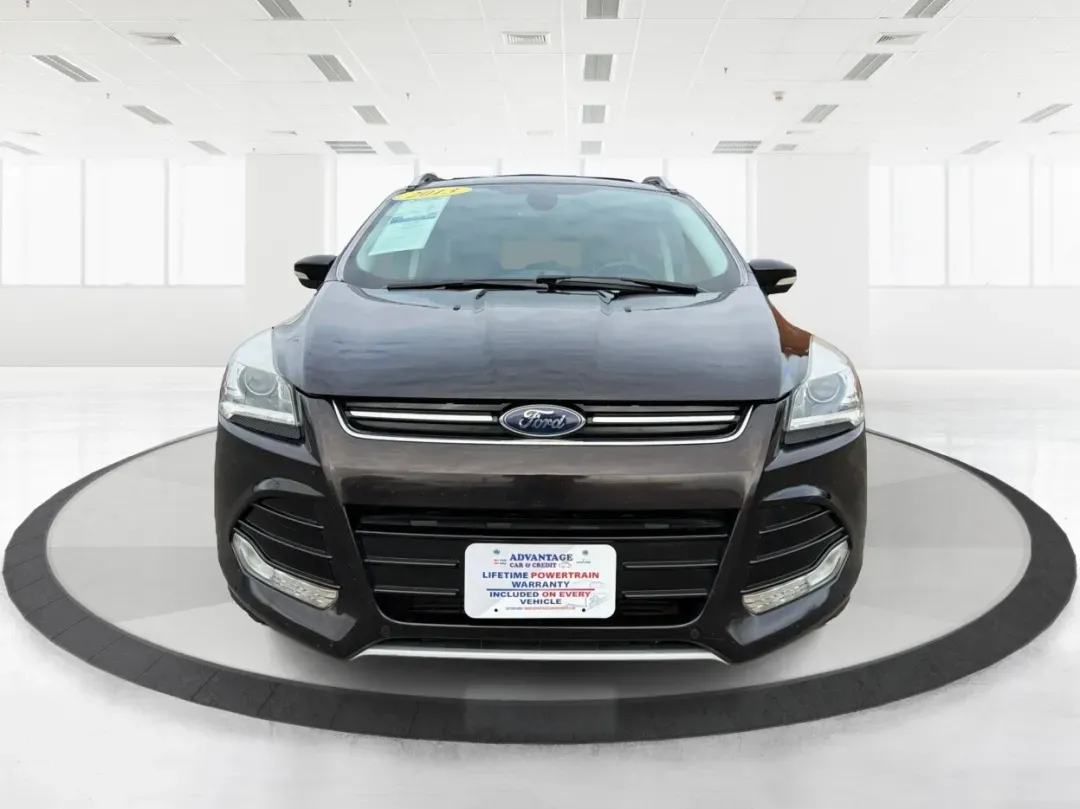 2013 Ford Escape Titanium (1FMCU9J90DU) with an EcoBoost 2L I-4 gasoline direct injection engine, located at 401 Woodman Dr, Riverside, OH, 45431, (937) 908-9800, 39.760899, -84.123421 - **Explore the Open Road with Confidence: 2013 Ford Escape Titanium at Advantage Car and Credit!**<br /> <br /> Are you ready for your next adventure? Whether you're taking the kids to soccer practice, planning weekend getaways, or commuting to work, this 2013 Ford Escape Titanium is the perfect comp - Photo#7