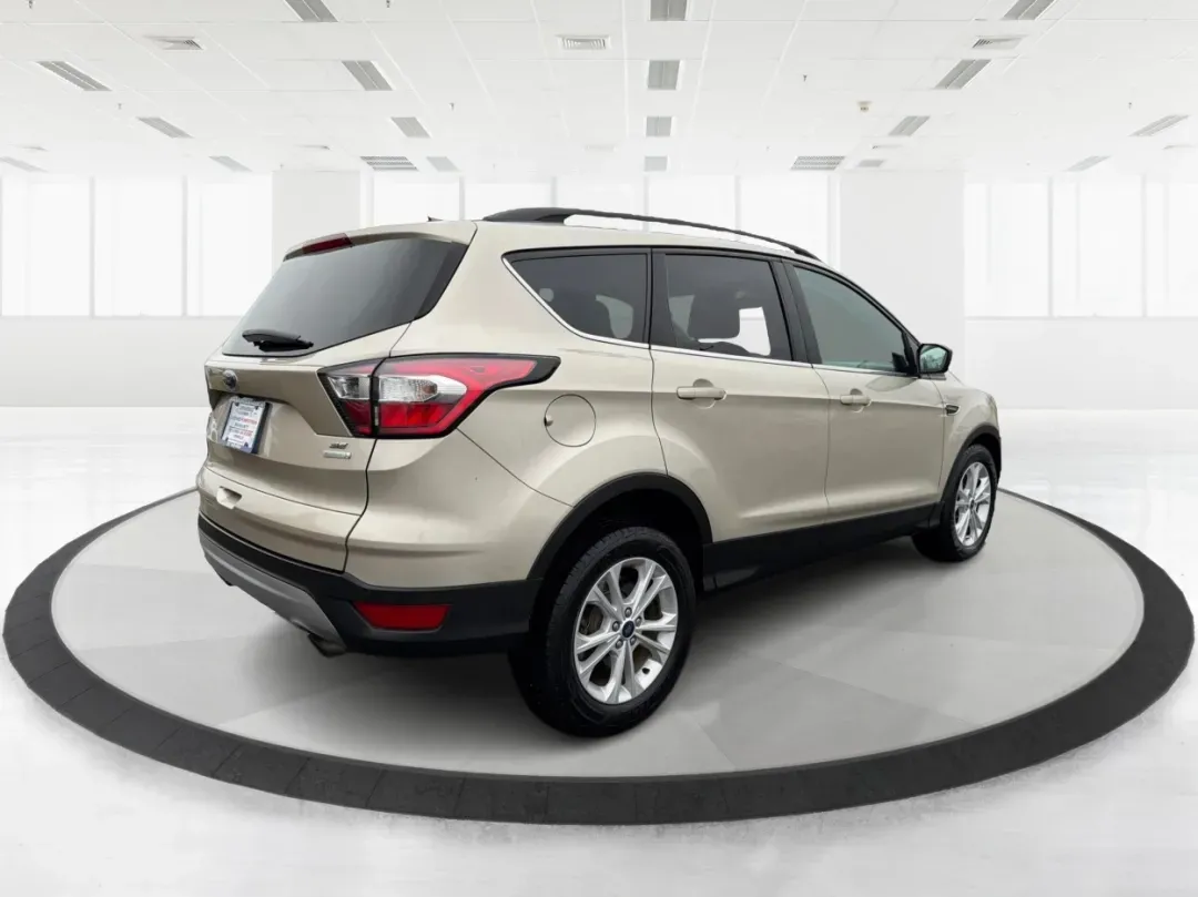 2017 Ford Escape SE (1FMCU0GD1HU) with an Other engine, located at 4508 South Dixie Dr, Moraine, OH, 45439, (937) 908-9800, 39.689976, -84.218452 - Are you ready to elevate your driving experience? Whether you're navigating daily commutes, embarking on weekend getaways, or simply enjoying family outings, the 2017 Ford Escape SE is the perfect companion for your active lifestyle. This well-appointed SUV promises versatility and comfort, making i - Photo#2