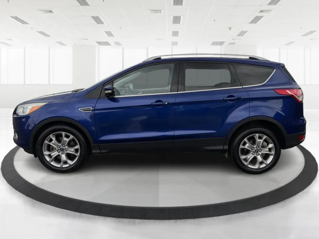2015 Ford Escape Titanium (1FMCU0J92FU) with an Other engine, located at 880 E. National Road, Vandalia, OH, 45377, (937) 908-9800, 39.891918, -84.183594 - **Adventure Awaits with the 2015 Ford Escape Titanium Your Ideal SUV for Every Journey!**<br /> <br /> Are you looking for the perfect vehicle to accommodate family outings, weekend adventures, or long commutes? The 2015 Ford Escape Titanium, available now at Advantage Car and Credit in Vandalia, O - Photo#5