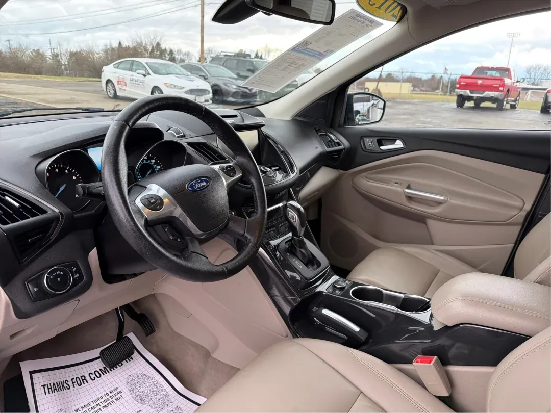 2015 Ford Escape Titanium (1FMCU0J92FU) with an Other engine, located at 880 E. National Road, Vandalia, OH, 45377, (937) 908-9800, 39.891918, -84.183594 - **Adventure Awaits with the 2015 Ford Escape Titanium Your Ideal SUV for Every Journey!**<br /> <br /> Are you looking for the perfect vehicle to accommodate family outings, weekend adventures, or long commutes? The 2015 Ford Escape Titanium, available now at Advantage Car and Credit in Vandalia, O - Photo#9